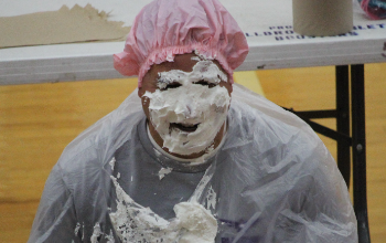 Jim Benetis gets a pie in the face