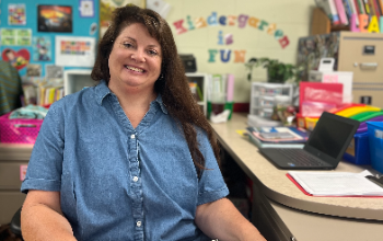Jennifer Huff sits at her desk at Stephen Bell Elementary School. She is a Teacher Leader Liaison with the Ohio Department of Education for the next two years. 