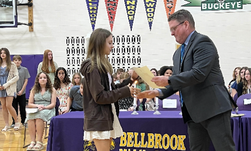 Jeff Eckley hands out awards at the NJHS ceremony